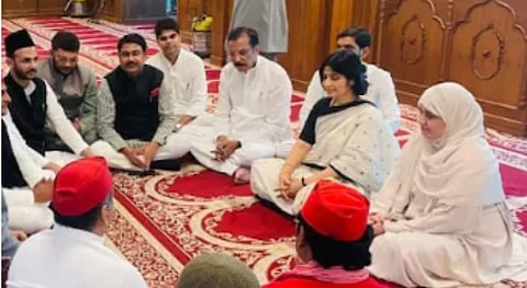 The Muslim community questioned the appropriateness of Yadav's dress for a place of worship.