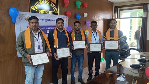 The felicitation ceremony, held at the District Collectorate, recognized BLOs who achieved remarkable milestones in elector form (EF) digitization.