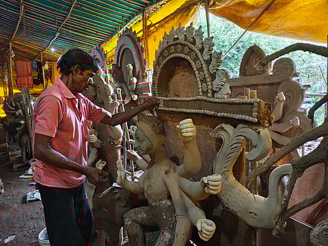 Artisans admitted to using distempers, oil paints, and wall paints on clay idols, while decorative plastics were commonly used to make idols more appealing to buyers.
