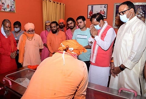 Deputy CM Keshav Maurya and Minister Brajesh Pathak paying their last respects to Mahant Narendra Giri
