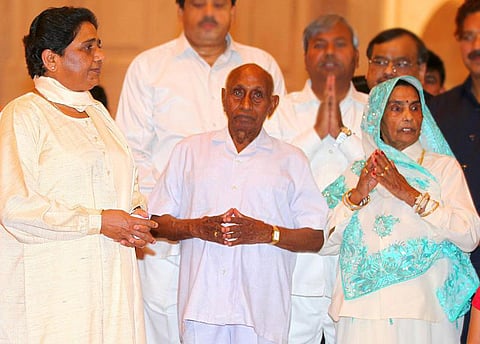 Mayawati with her father and other. (File Photo)