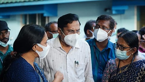 Health Minister Veena George with officials at the Kozhikode Medical College Hospital