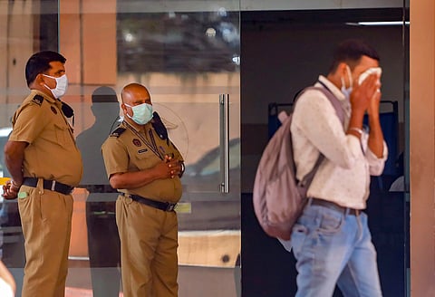 Security personnel at a medical college after the Nipah virus alert in Kozhikode on September 12, 2023
