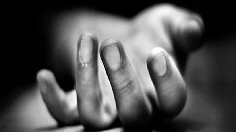 Hand of a person lying on the floor