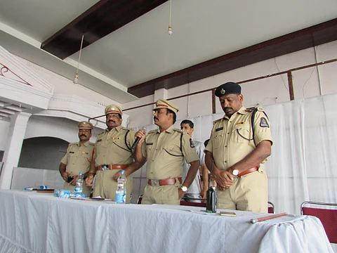 Hyderabad police addressing men apprehended under Operation Chabutra