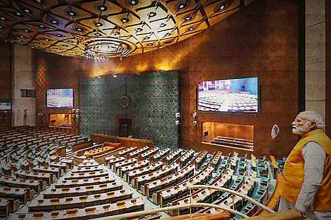 A stylised image of PM Modi in the new Parliament building