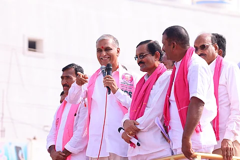 Telangana Finance Minister T Harish Rao with party members