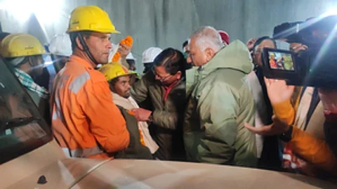Workers from the tunnel