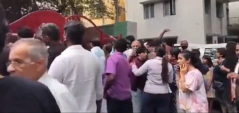 Parents outside a school