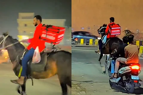 Screengrabs from the video of the Zomato rider on horseback in Hyderabad