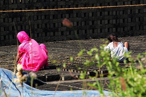 Children working on construction site