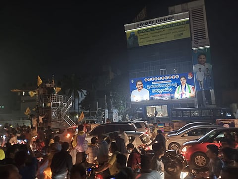 A massive TDP rally passed by the YSRCP office in Guntur West, destroying hoardings and shouting slogans on the way