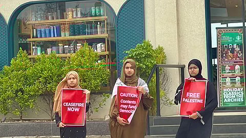 Protest by student activists of Fraternity Movement in front of Starbucks outlet in Kozhikode.