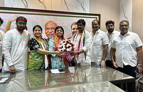 GHMC Deputy Mayor Mothe Srilatha Shobhan Reddy (second from left) and husband (fourth from right) joined Congress party