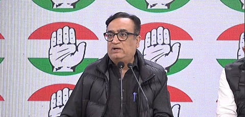 Congress leader Ajay Maken addressing the press.