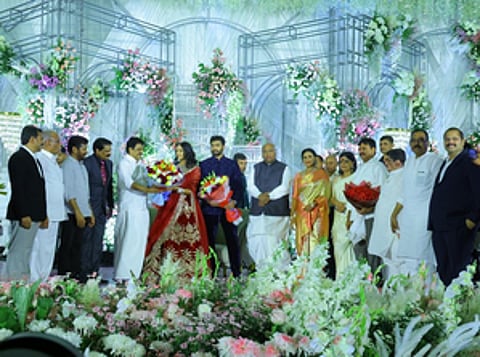 Kharge, YS Sharmila and other Congress leaders posing with the couple