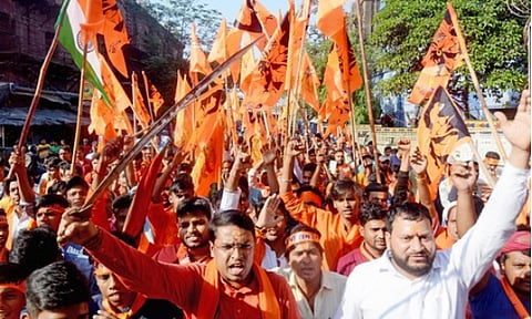 BJP workers protesting the removal of the Hanuman flag in Mandya