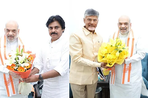 Union Home Minister Amit Shah with Jana Sena head Pawan Kalyan and TDP chief Chandrababu Naidu.
