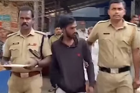 Accused being arrested by police