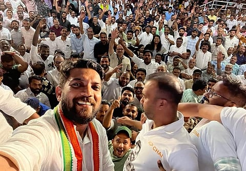 Shafi Parambil with non-resident voters in Sharjah