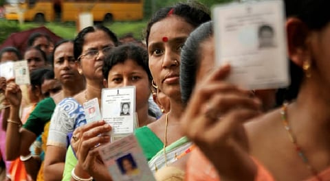 Voters standing in a queue