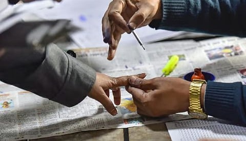 A person voting