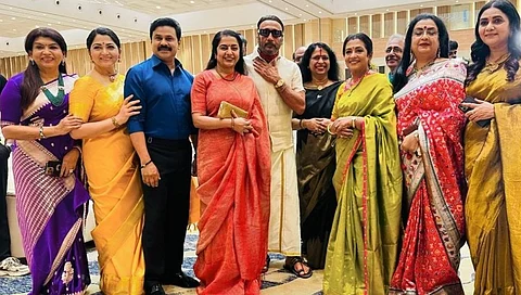 Actors posing with Malayalam actor Dileep