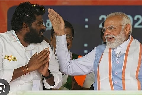Tamil Nadu BJP president K Annamalai with PM Modi.