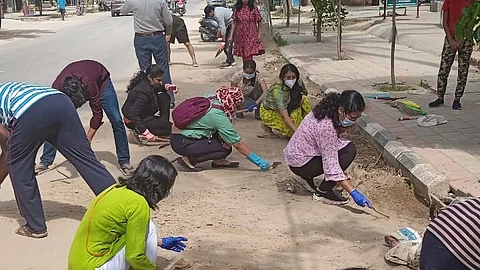 Residents de-silting the road