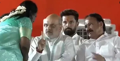 Home Minister Amit Shah speaking to TN BJP leader Tamilisai Soundararajan.