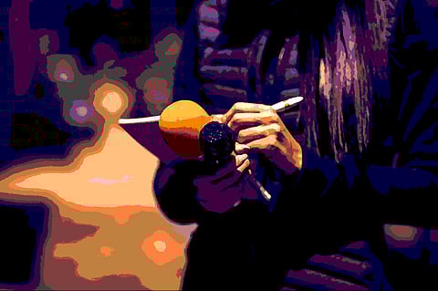 Representative pic: A journalist holding a microphone and a notepad