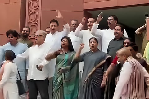 Opposition MPs protesting outside the new Parliament building against wrestler Vinesh Phogat's disqualification from the Olympic games.