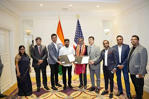 Telangana Chief Minister Revanth Reddy with Swachh Biogreen chairman Praveen Paripati