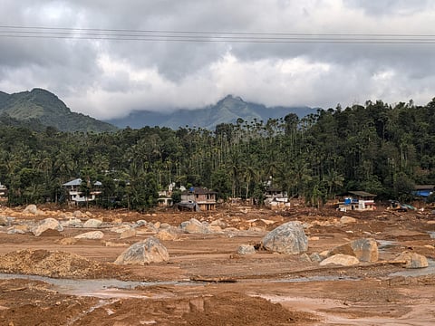 The few houses that barely escaped being swept away by the landslides
