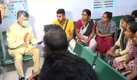 Andhra Pradesh CM Chandrababu Naidu with family members of blast victims.