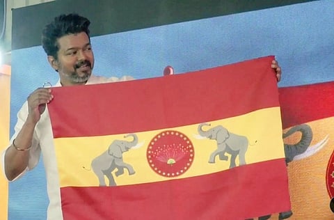 Vijay with Tamilaga Vettri Kazhagam party flag