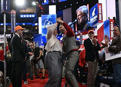 Attendees dance as a band plays during the last day of the 2024 Republican National Convention in Milwaukee. Brendan Smialowski/AFP via Getty Images