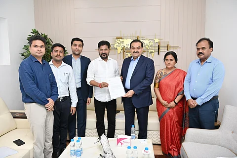 Telangana CM Revanth Reddy and Gautam Adani.