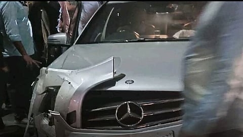 Driver of a Mercedes Benz crashes into road median in Hyderabad