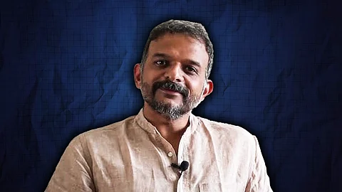 Carnatic musician TM Krishna in a beige kurta against a stylised dark blue background