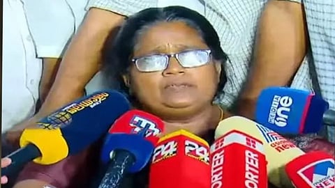Kala Raju, wearing traditional attire, posing for the camera against a neutral background.