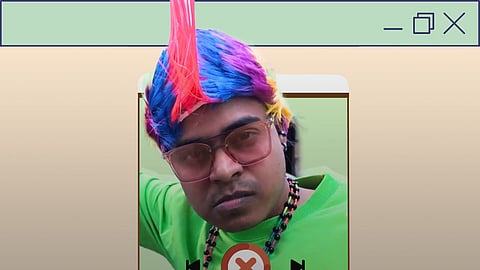 Image of Kannada influencer Vickypedia wearing a colourful wig in his video titled "Porki man"