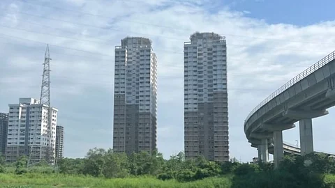 Image of Army Tower apartments in a panoramic view against the Kochi sky