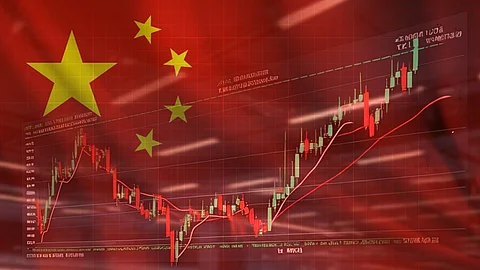 A digital stock market chart with green and red candlesticks overlays the Chinese flag, symbolising China's economic growth and influence in global markets.