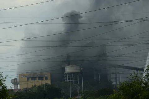 Think, dark smoke coming out of a thermal power plant's unit.