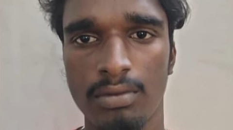 Image featuring Jojo wearing a red t-shirt.