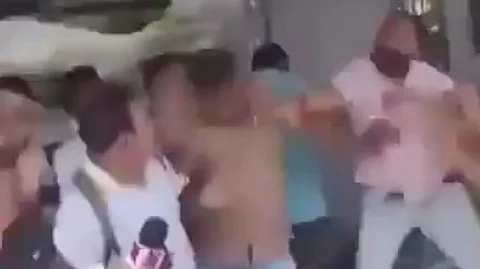 A screengrab showing the journalist being assaulted by BJP workers