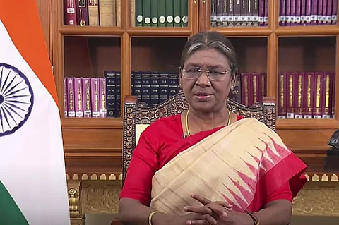 President Droupadi Murmu in formal attire, looking ahead with a neutral expression during an official event.
