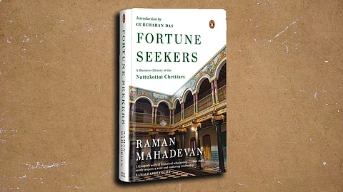 Cover of the book Fortune Seekers: A Business History of the Nattukottai Chettiars by Raman Mahadevan, featuring an image of a grand traditional Chettiar mansion with ornate pillars and arches.