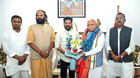Telangana CM Revanth Reddy and others with Union Urban Affairs Minister Manohar Lal Khattar